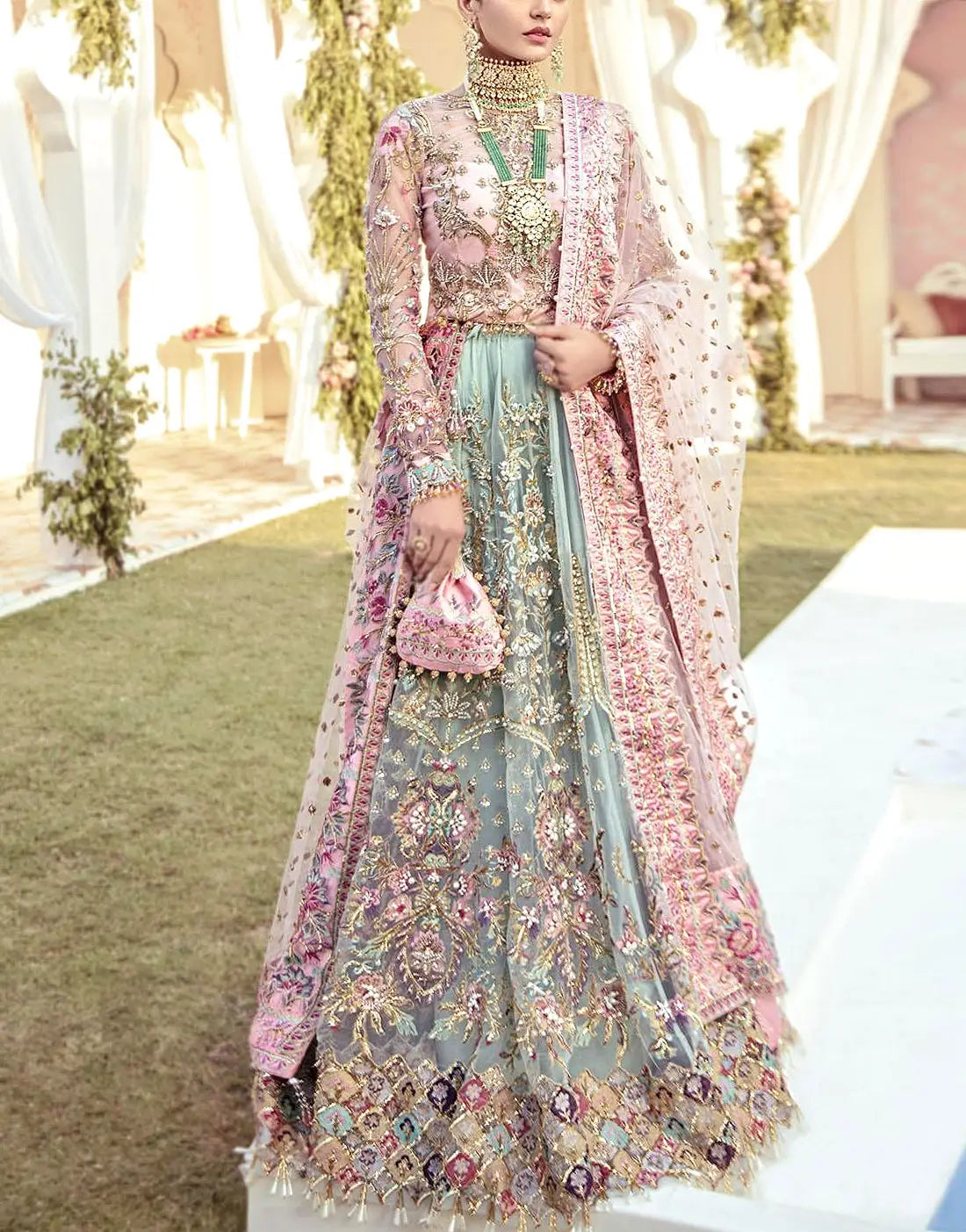 Glamorous Embroidered Net Bridal Lehenga in Blush Pink & Sage Green Color with Colorful Embellishments