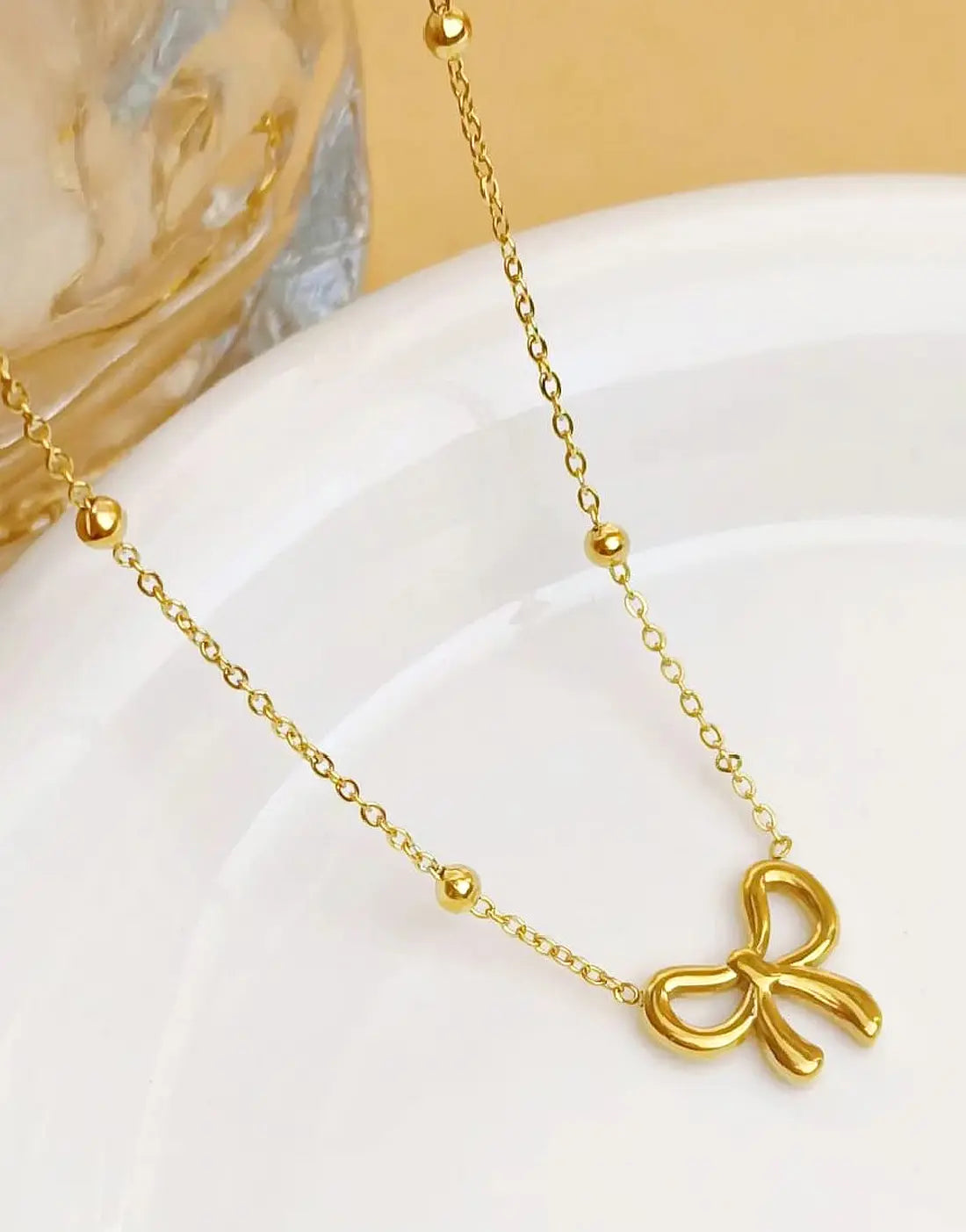Minimalist Gold Plated Stainless Steel Bow Shaped Locket Set