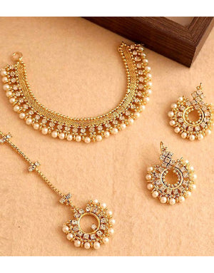 Elegant Pearl Golden Jewelry Set with Earrings & Tikka