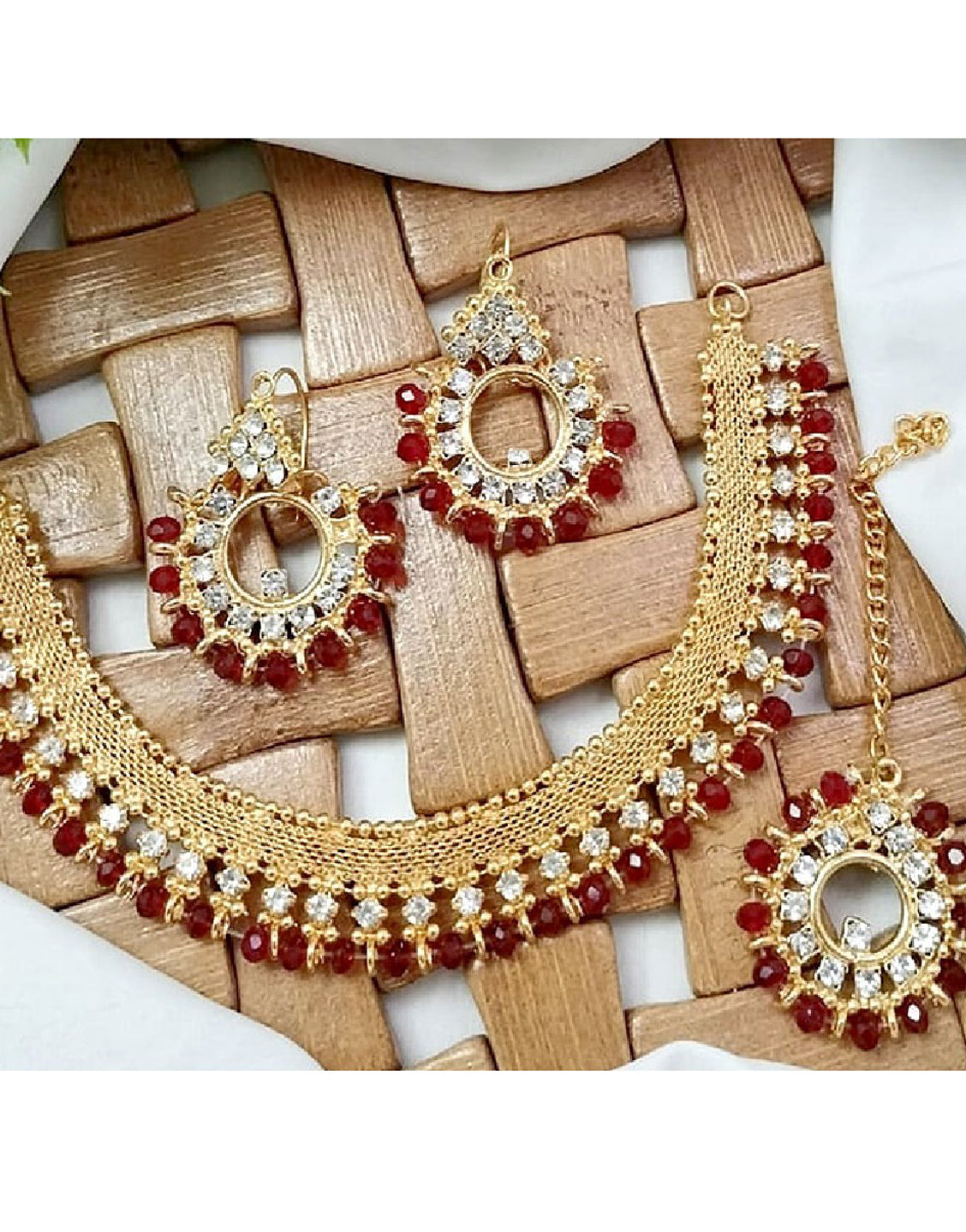 Elegant Red Stones Golden Jewelry Set with Earrings & Tikka