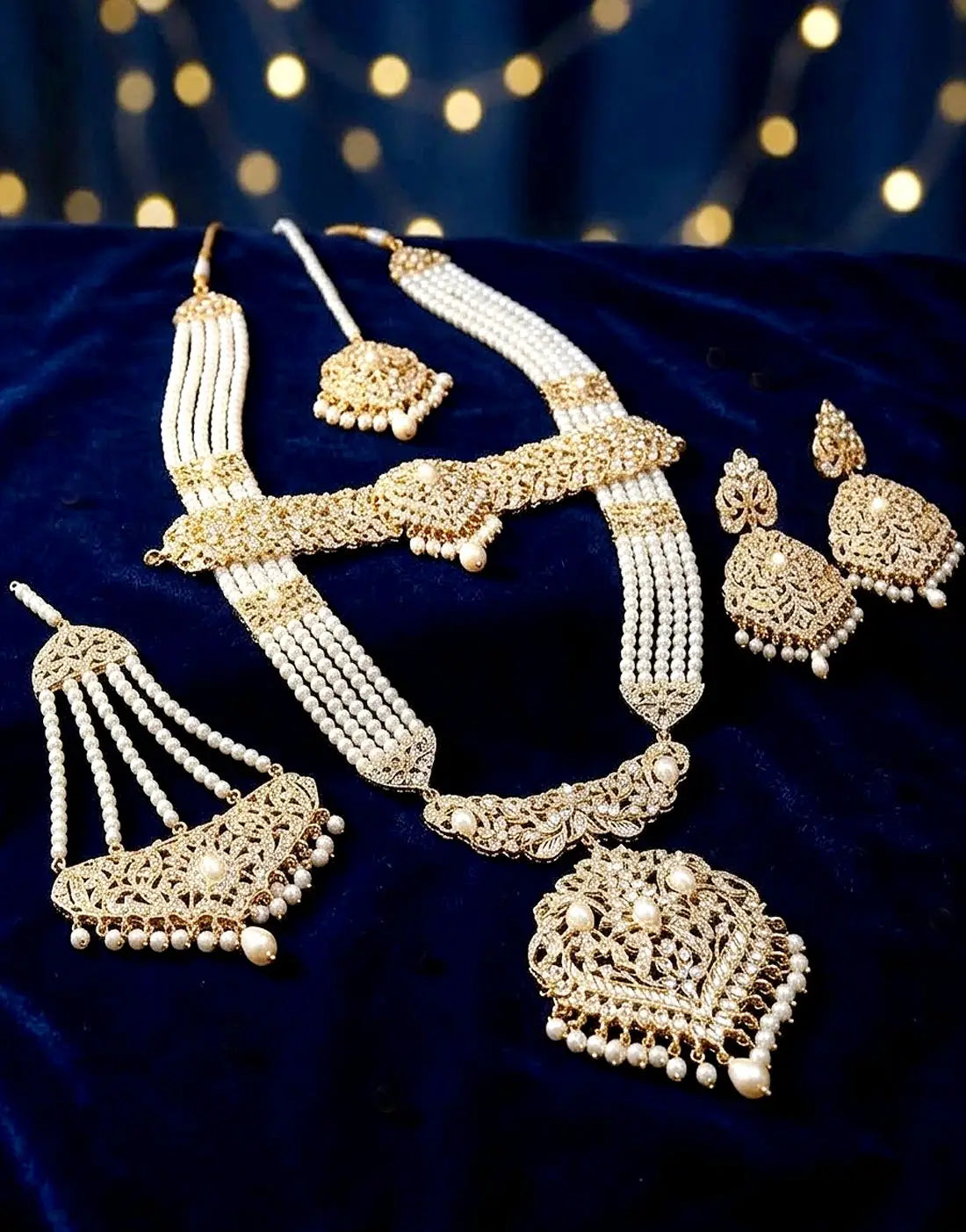 Luxurious Hyderabadi Pearl Mala Bridal Jewellery Set with Choker, Earrings, Jhumar and Maang Tikka