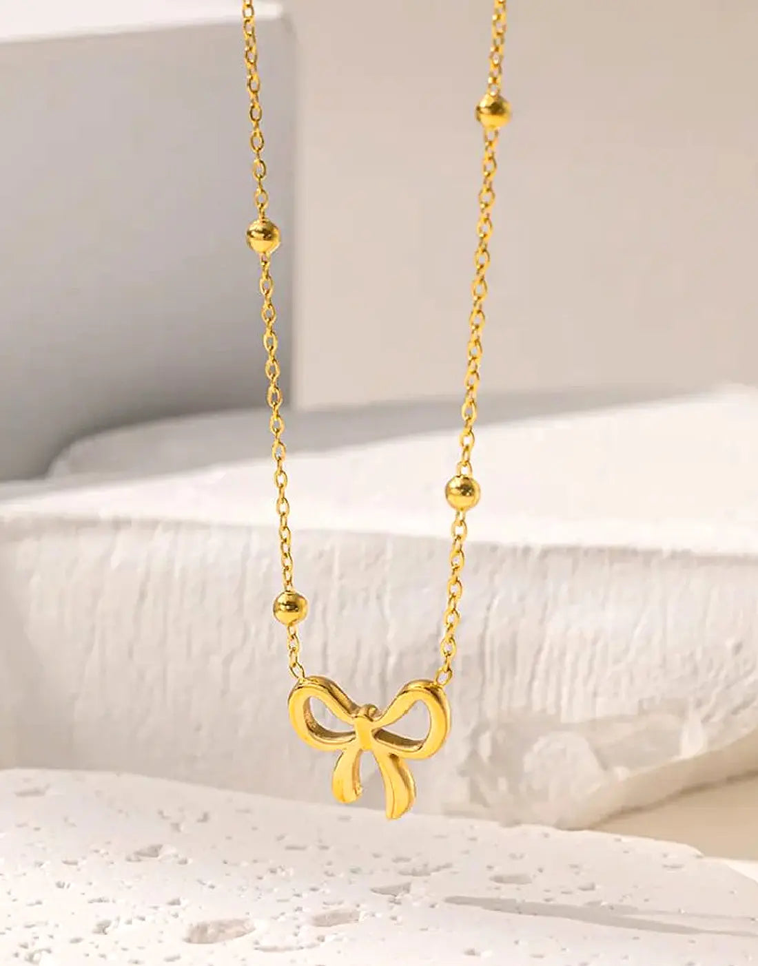 Minimalist Gold Plated Stainless Steel Bow Shaped Locket Set