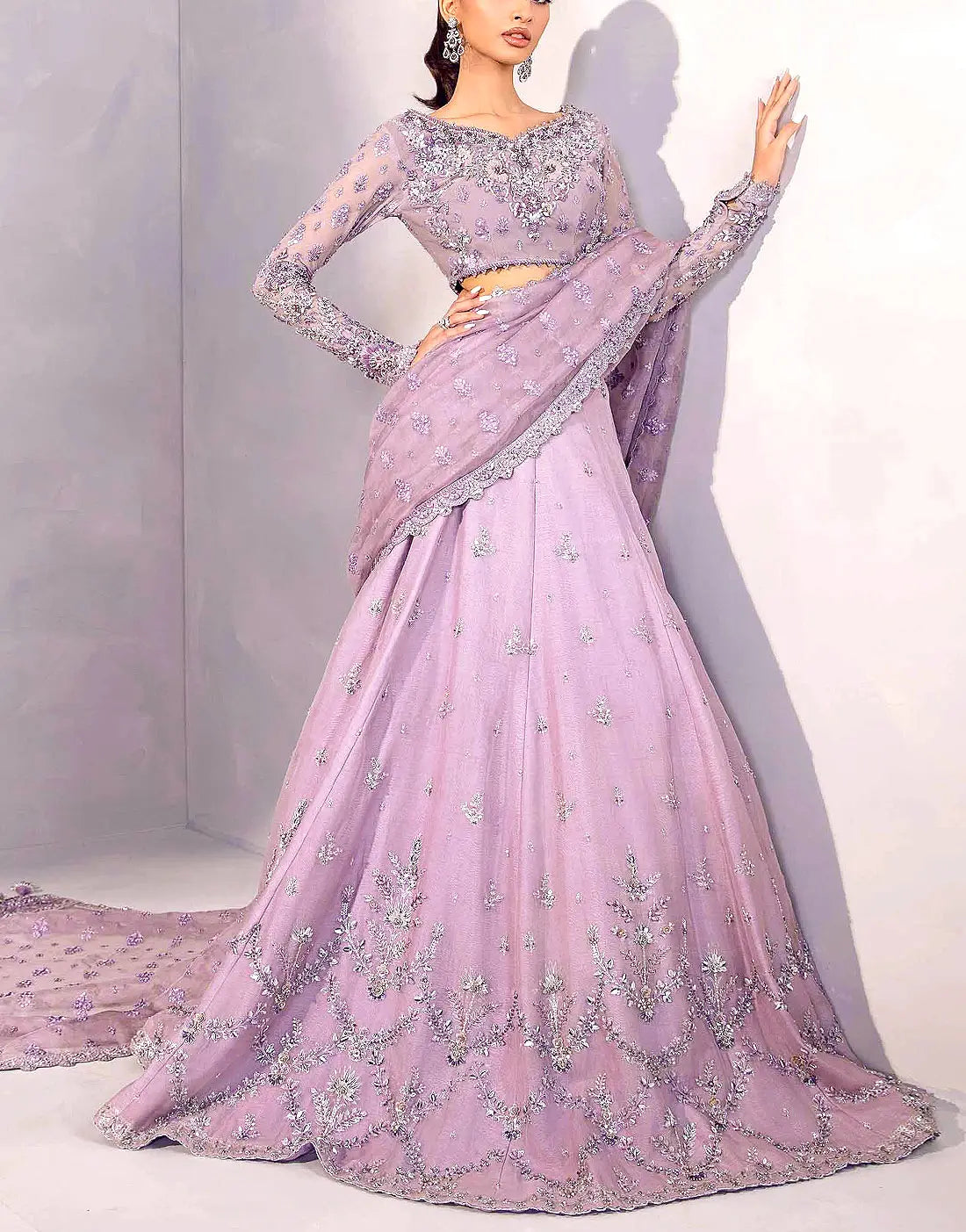 Glamorous Heavy Embroidered Mauve Net Lehenga Dress with Hand Embellishments