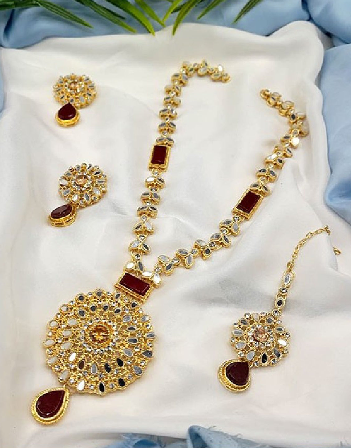 Elegant Golden Jewelry Set with Earrings & Tikka