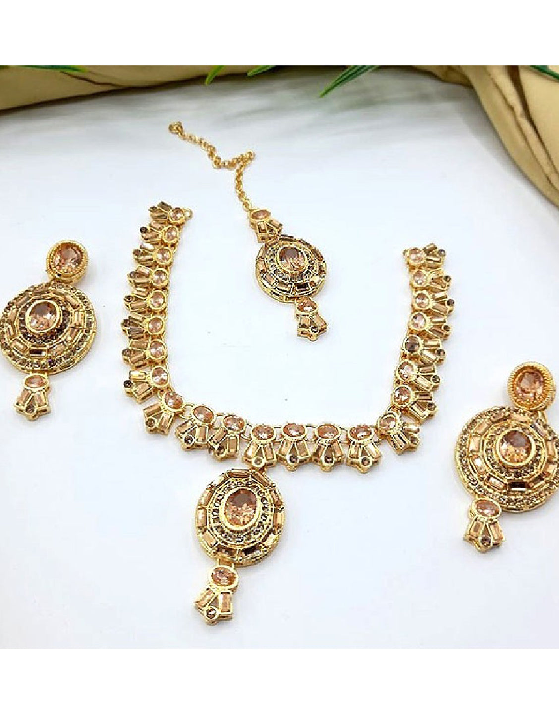 Elegant Golden Jewelry Set with Earrings & Tikka