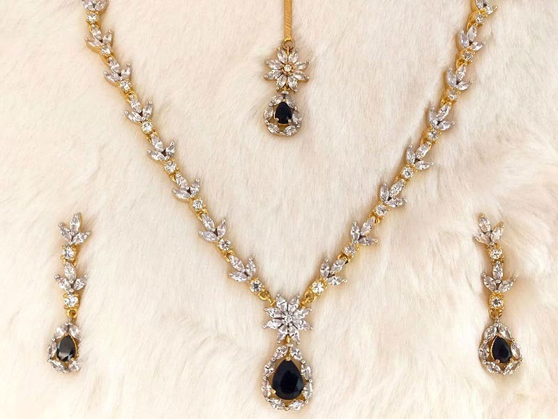 Elegant Golden Party Wear Jewelry Set with Earrings & Tikka