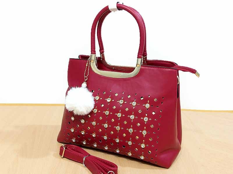 High Quality Faux-Leather Ladies Maroon Handbag with Hanging Pom Pom