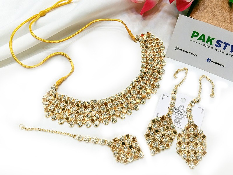 Elegant Golden Bridal Jewelry Set with Earrings & Tikka