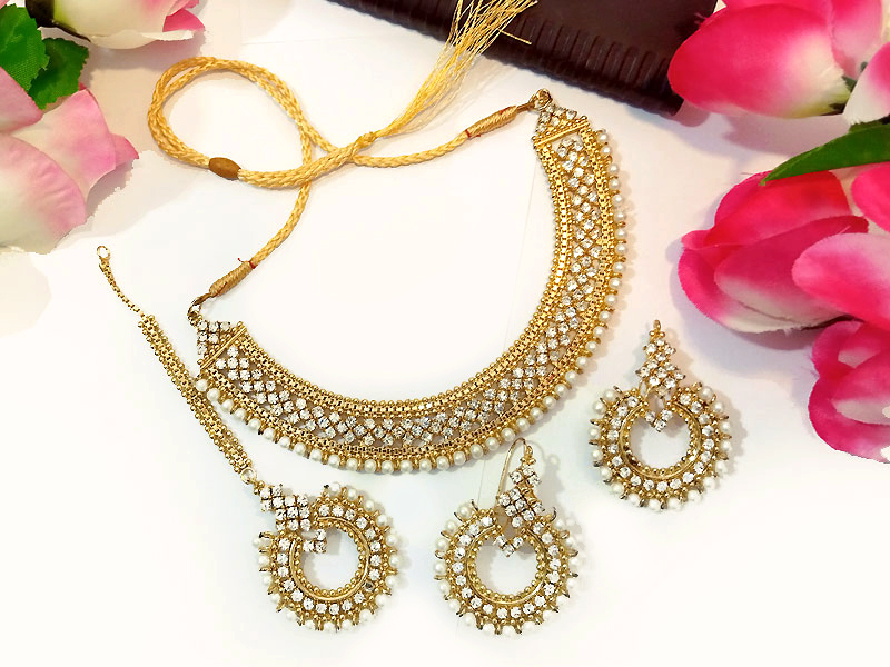 Ethnic Pearl Golden Jewelry Set with Earrings & Tikka