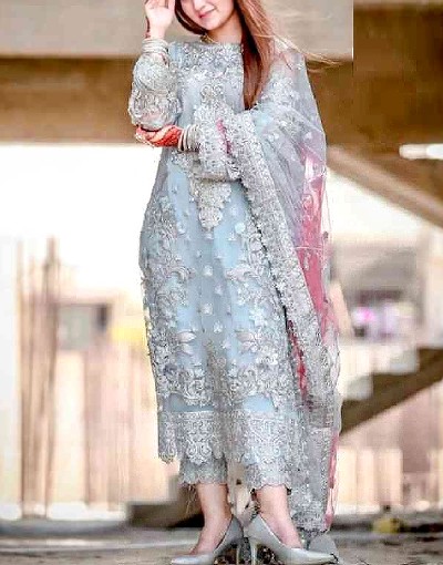 Pakistani girl in White and green dress